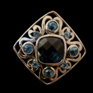 Elegant Silver and Blue Gemstone Brooch